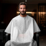 ECOTER Nonwoven hairdressing cape - SOFT (25 pc.) - Image 2