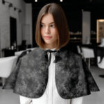Black nonwoven modeling and hairdressing cape (20 pc.) - Image 2